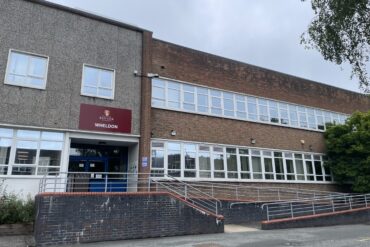 Image of the Wheldon Building entrance showing the steps and ramp